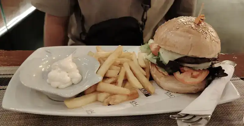 A burger with fries and a dip / เบอร์เกอร์กับเฟรนช์ฟรายส์และซอสจิ้ม