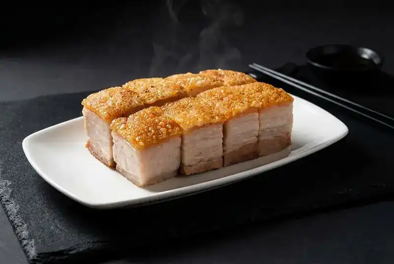 Crispy pork belly cut into cubes with a crackling top