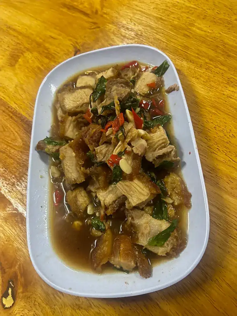 Pork belly stir-fried with chilli, garlic and herbs