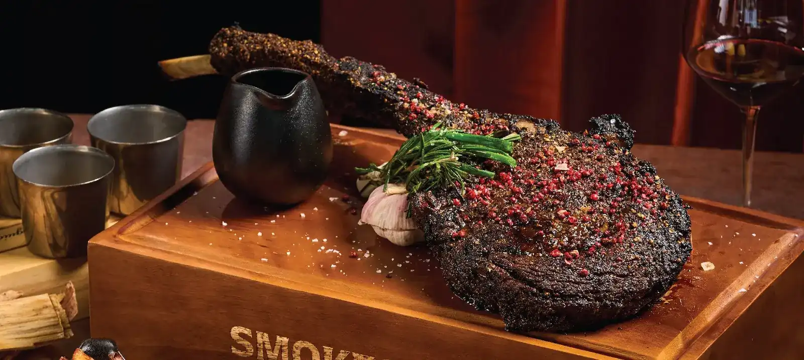 Wagyu beef tomahawk on a Smokestack serving board