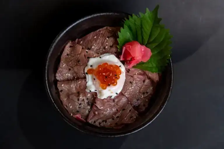 Wagyu beef rice bowl with a soft egg and salmon roe