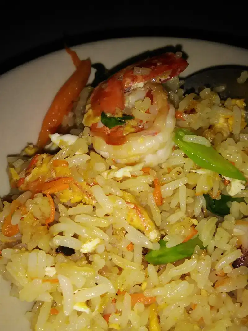 Prawn fried rice with egg, carrot and spring onion