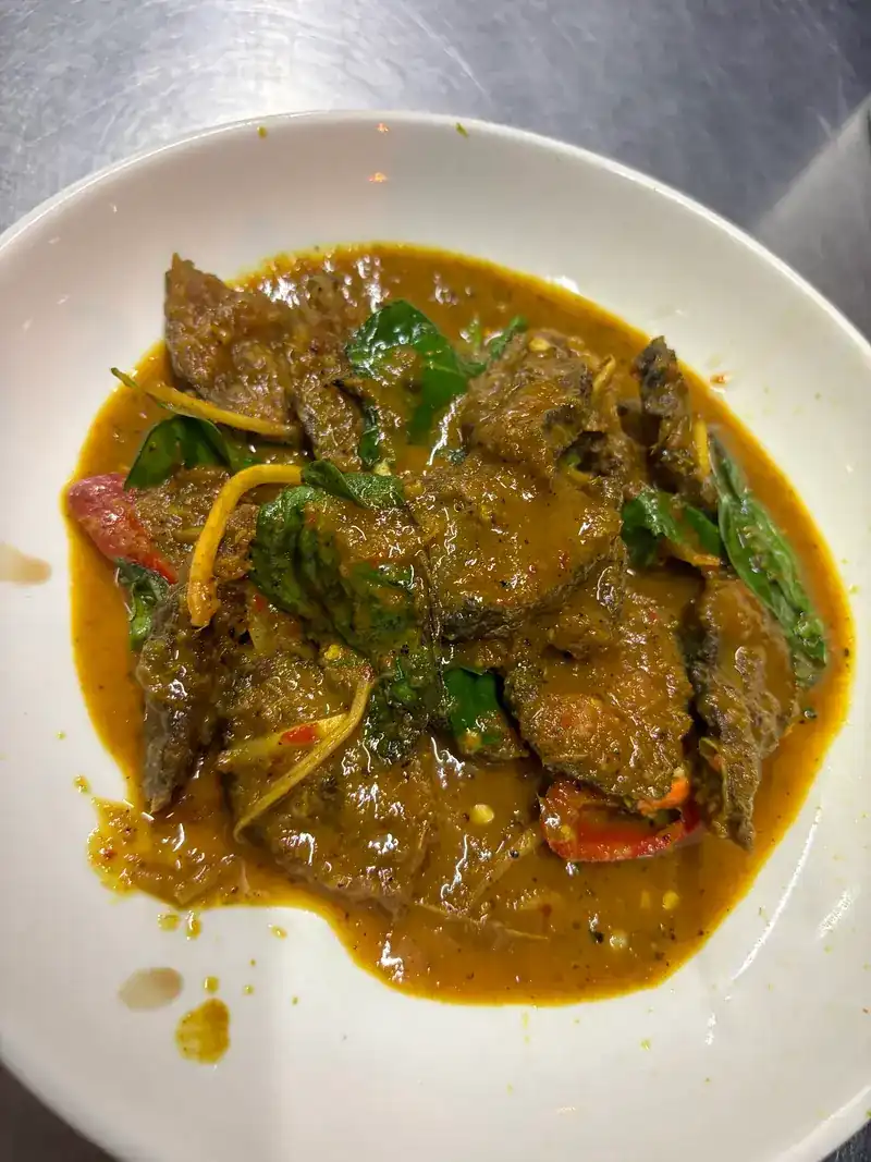 A thick curry stir-fry with basil, lime leaves and chilli