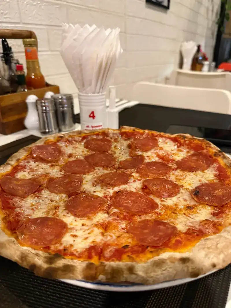 Pepperoni pizza on a thin base