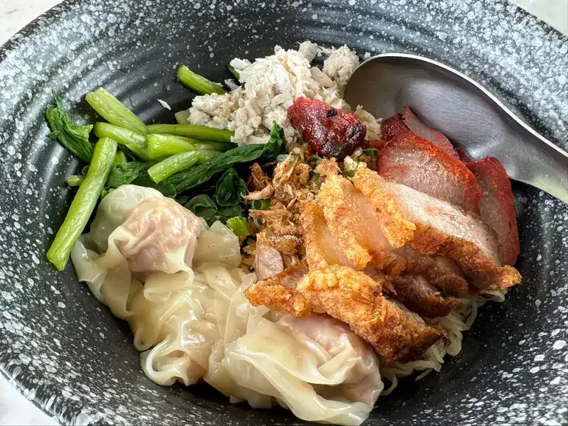 Egg noodles with wontons, red pork and crispy pork