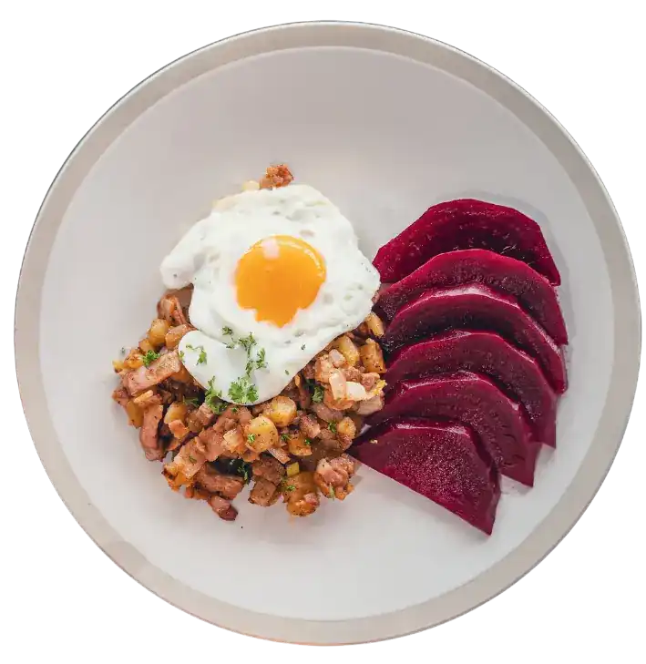 Swedish pyttipanna with a fried egg and beetroot