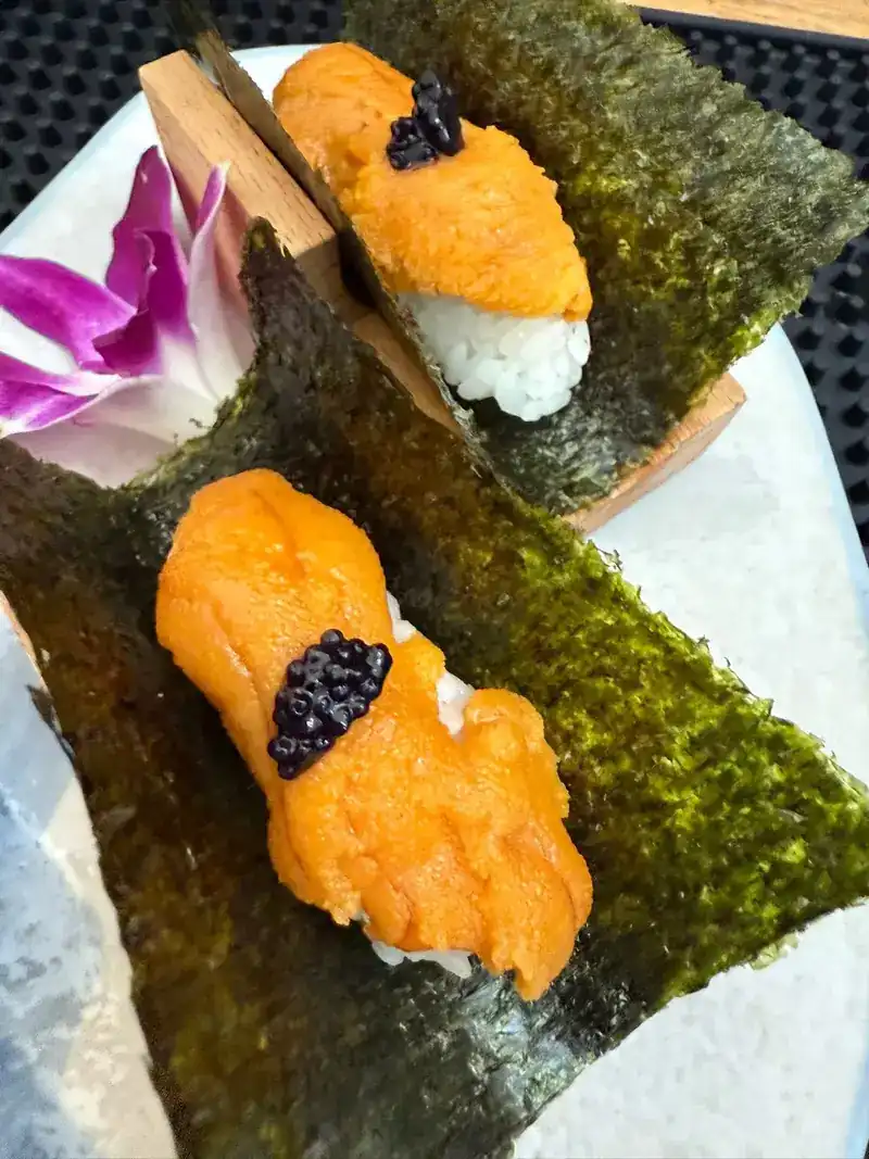 Sea urchin nigiri wrapped in seaweed