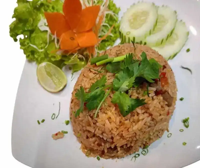Tom yum beef fried rice with coriander and cucumber