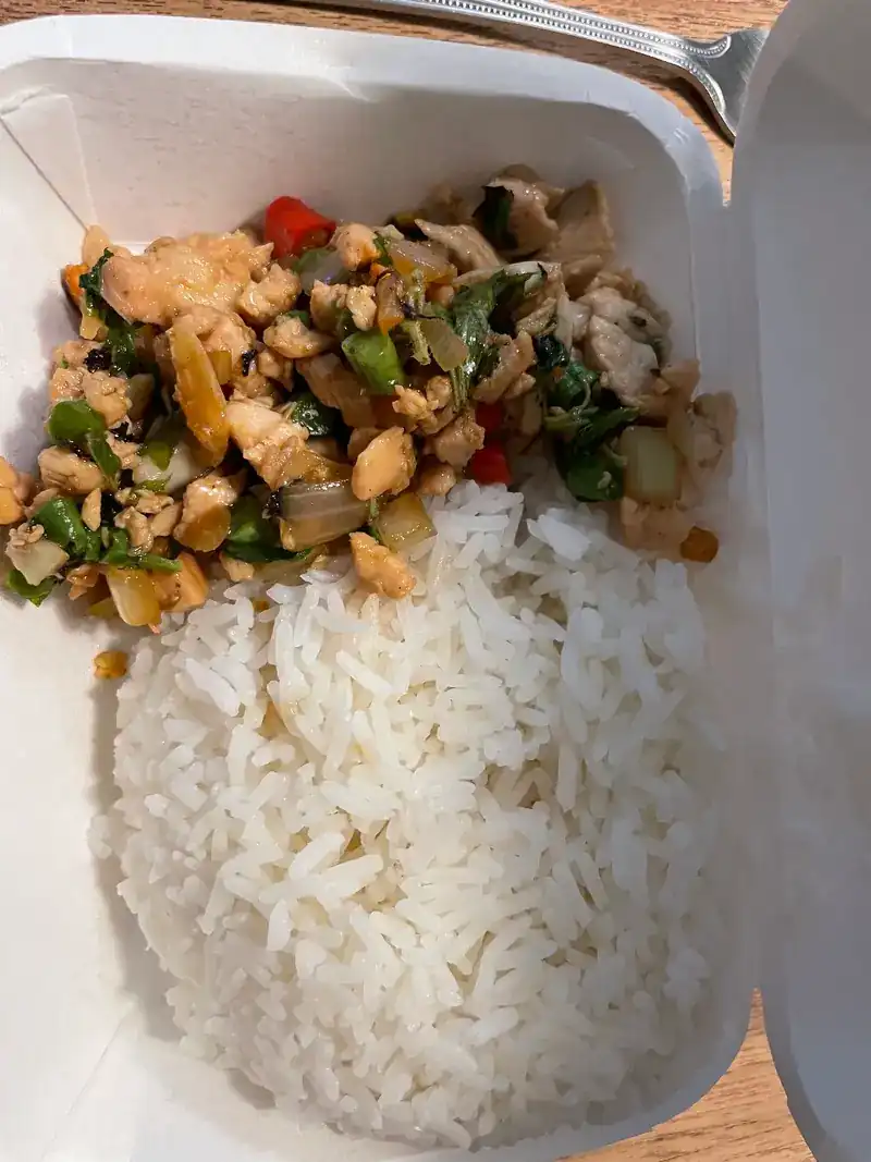 A stir-fry with rice, packed to take away