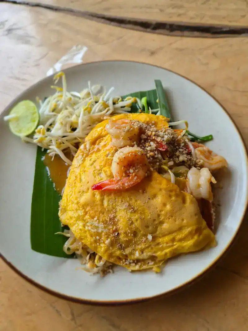 Pad thai wrapped in egg, with prawns