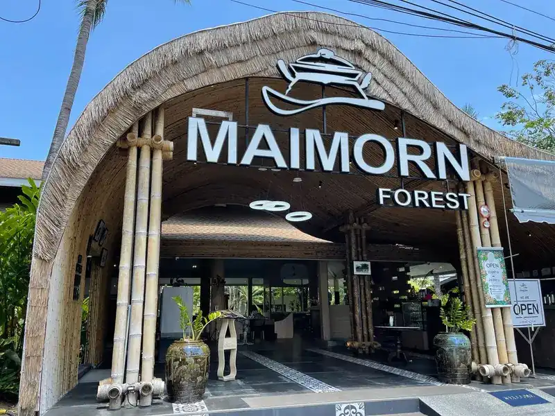 The thatched bamboo entrance of Maimorn Forest
