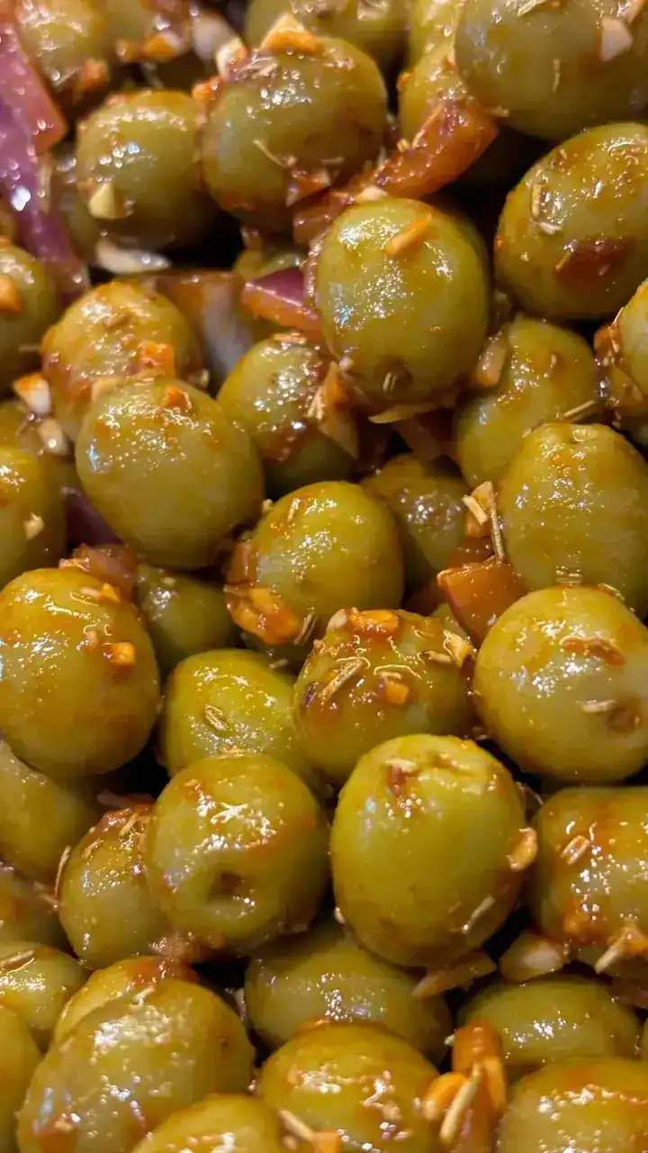 Green olives marinated with garlic and herbs