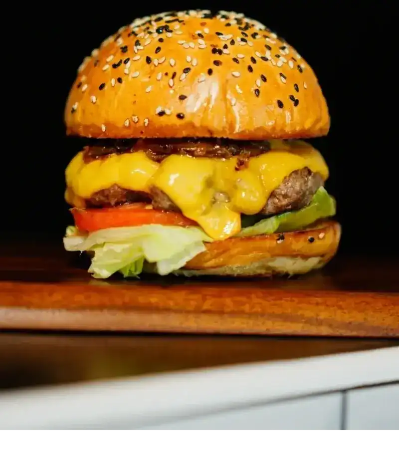 Original Millionaire, the beef burger with melted cheddar, lettuce and tomato