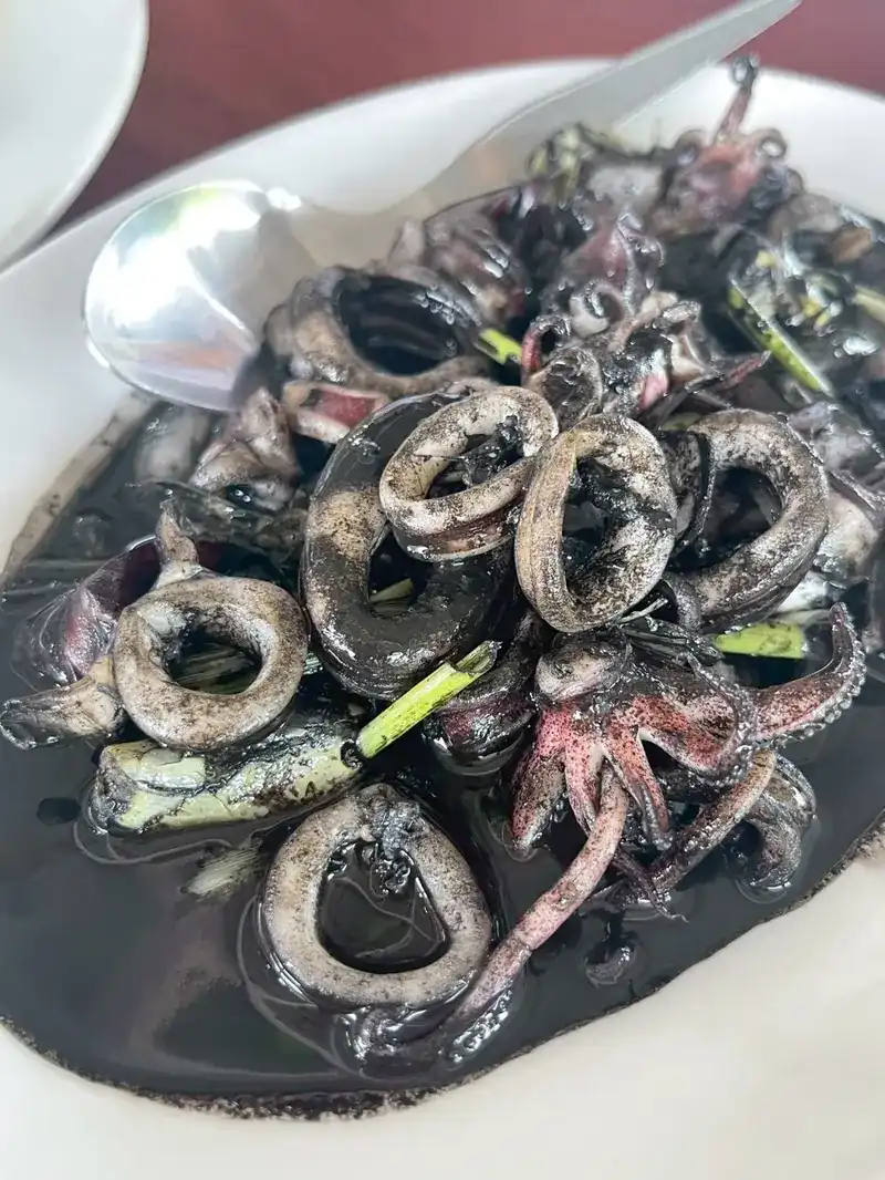 Squid rings in black squid ink