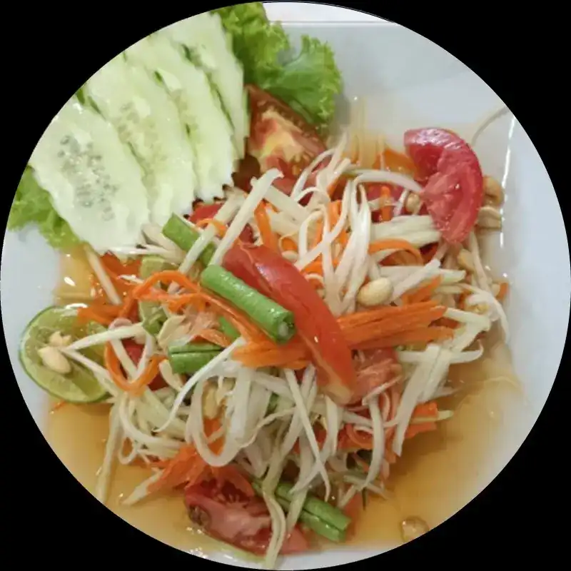Thai green papaya salad with cucumber and tomato