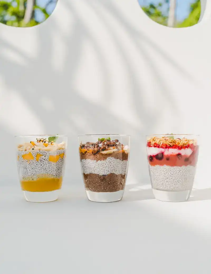 Three glasses of layered chia pudding