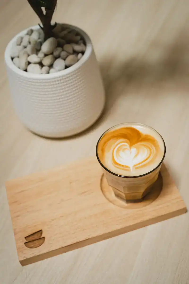 A latte with a heart poured on top