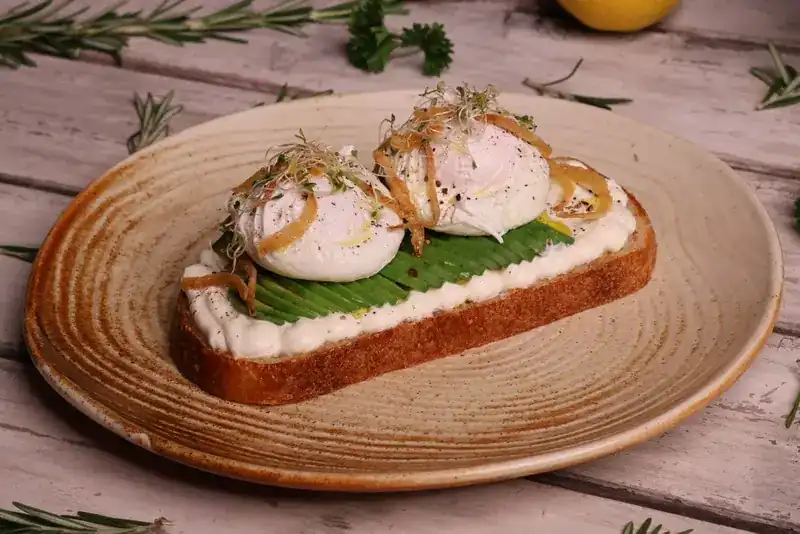 Avocado, ricotta and poached egg toast