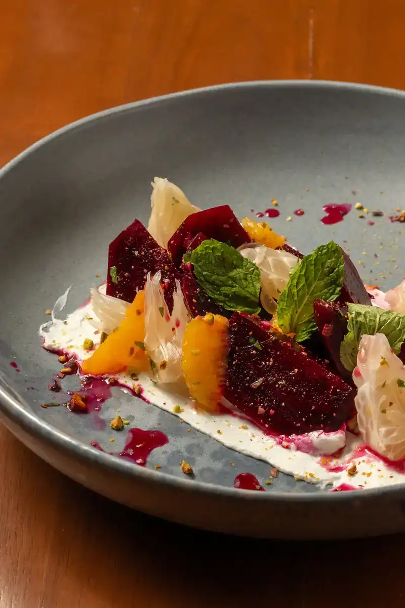 Roasted beetroot with orange, pomelo, labneh, mint and pistachio