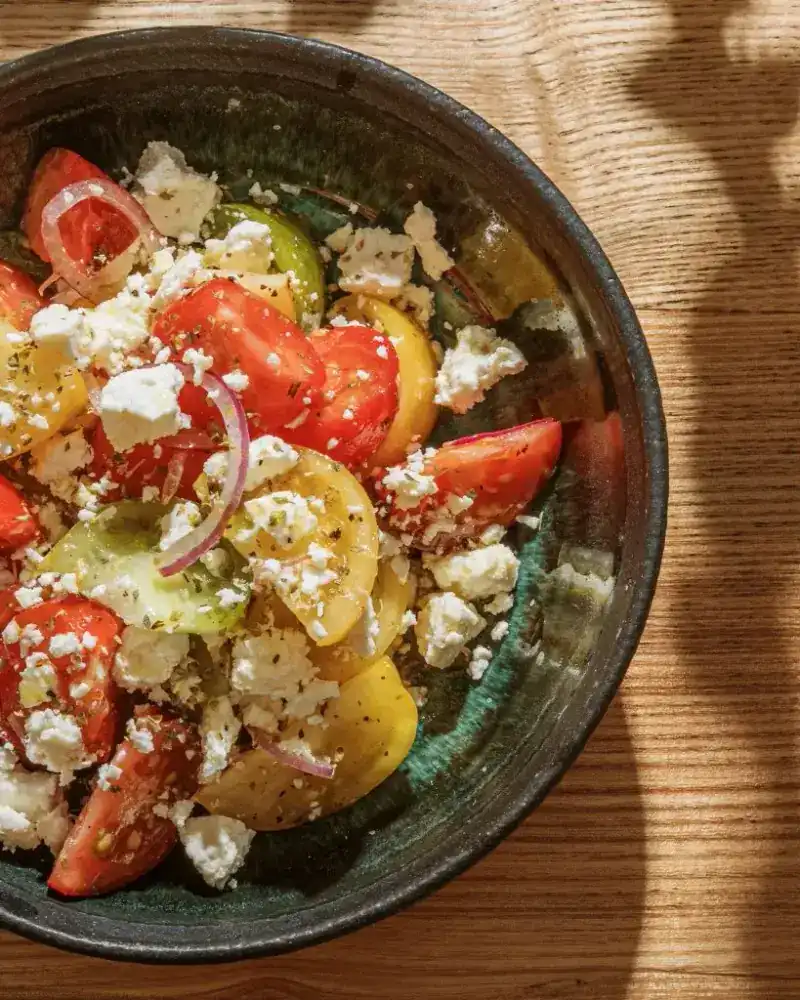 Heirloom tomato salad with feta and red onion