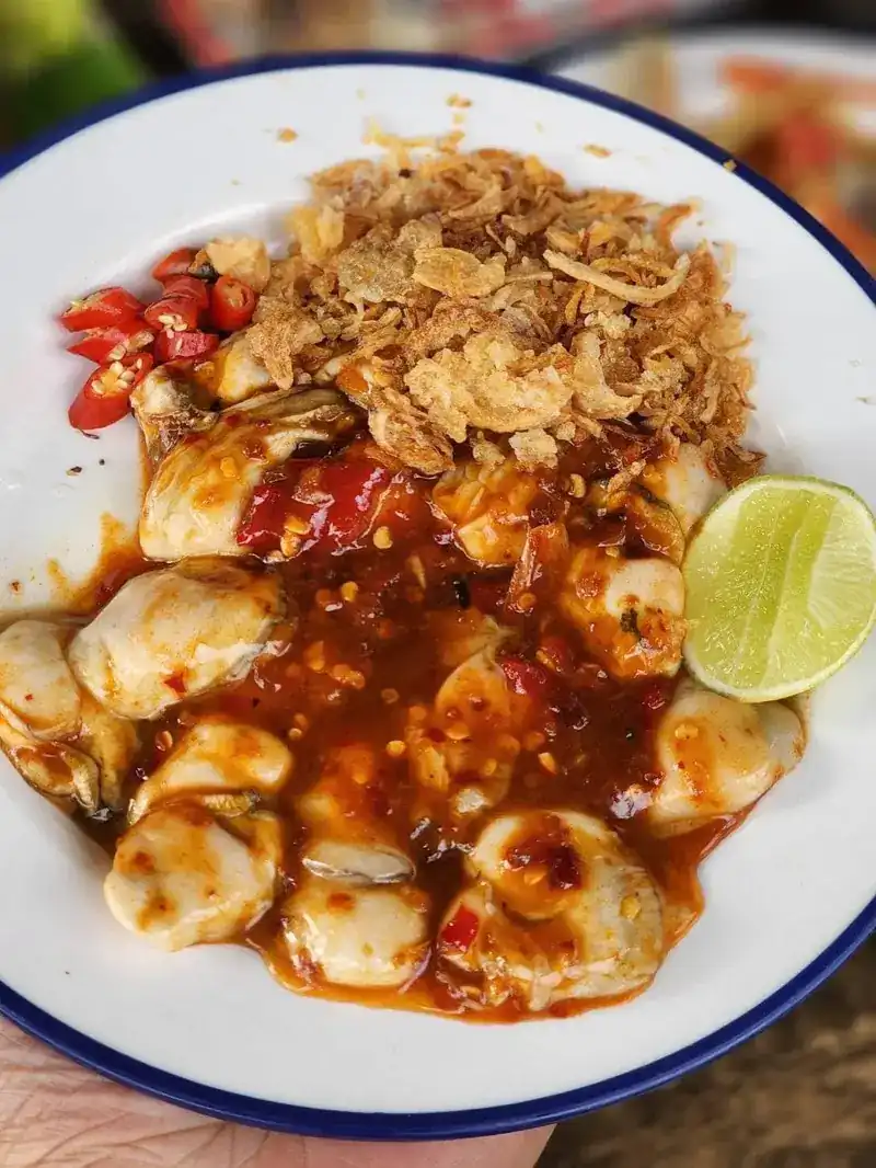 Shellfish in a chilli dressing with crispy shallots and lime