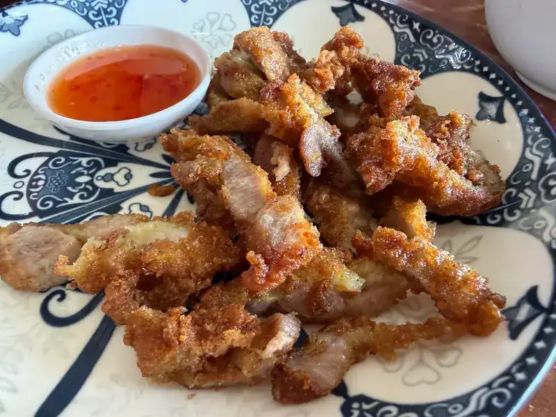 Crisp fried strips with a chilli dip