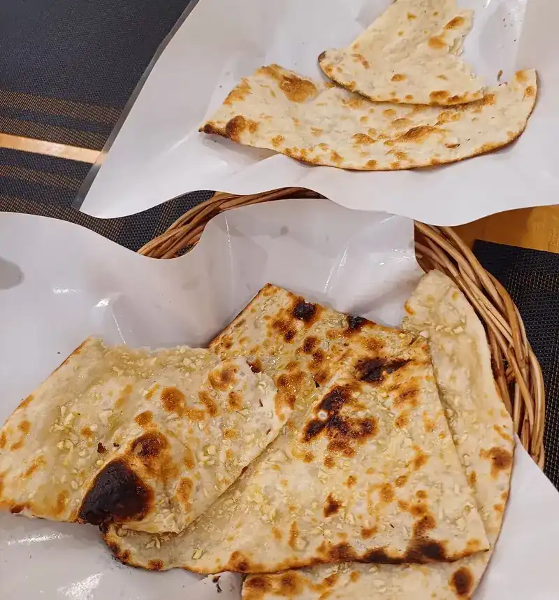Naan in a lined basket