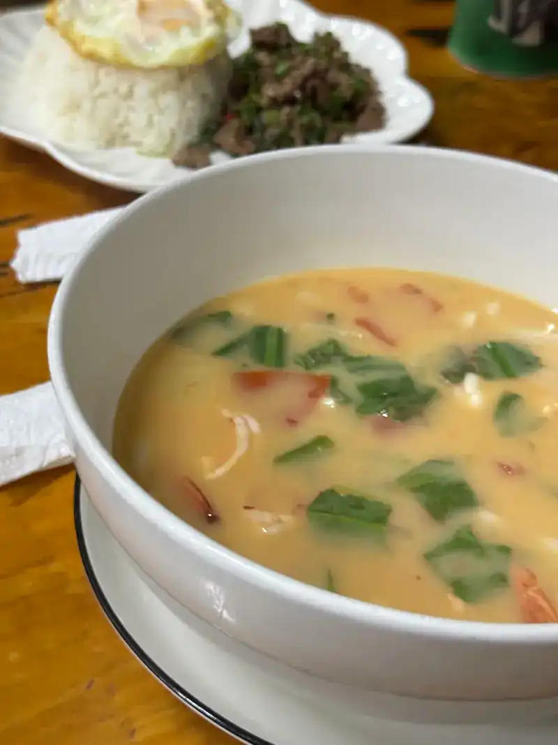 A bowl of creamy tom yum
