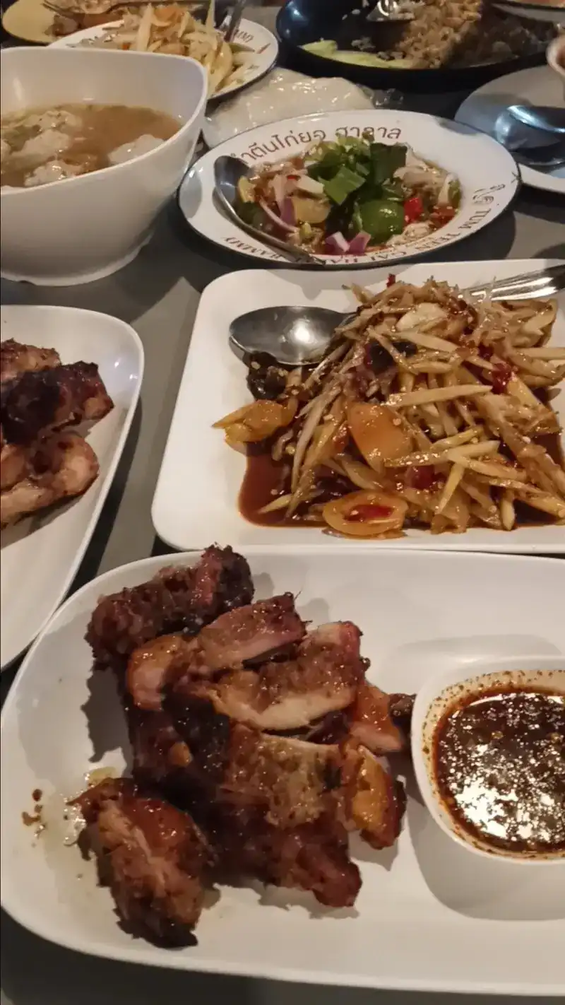 Grilled meat with jaew dipping sauce, papaya salad and soup