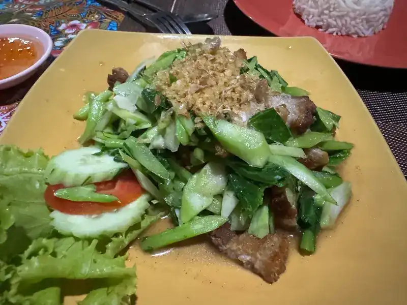 Stir-fried kale with crispy pork and fried garlic