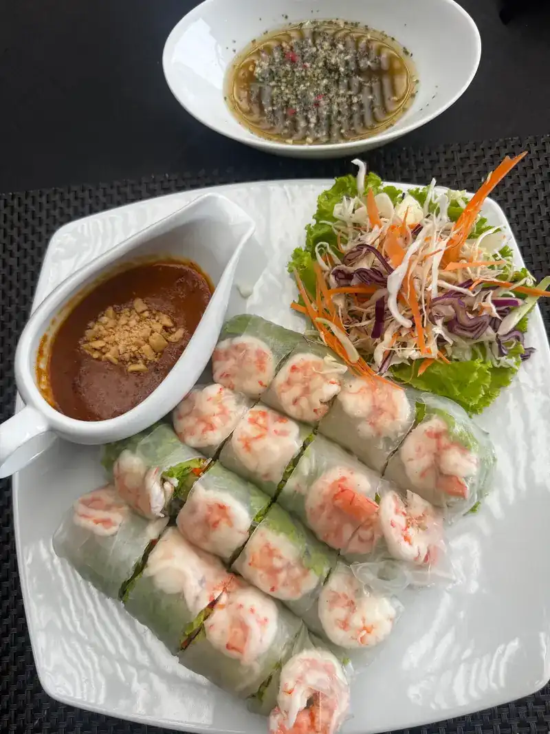 Fresh prawn spring rolls with peanut sauce and a chili dip