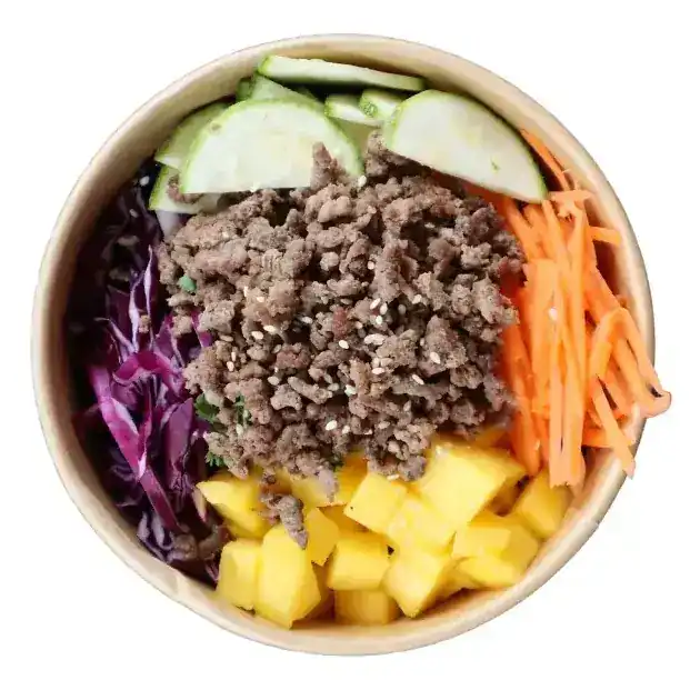 Poke bowl with seasoned beef, mango, cucumber, carrot and red cabbage
