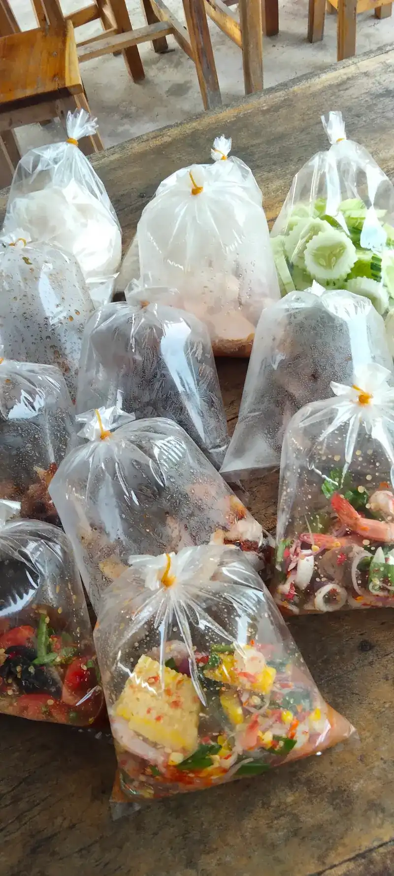 Papaya salads bagged up to take away