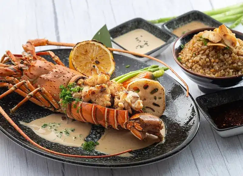 Teppanyaki lobster with grilled lemon, lotus root and garlic rice