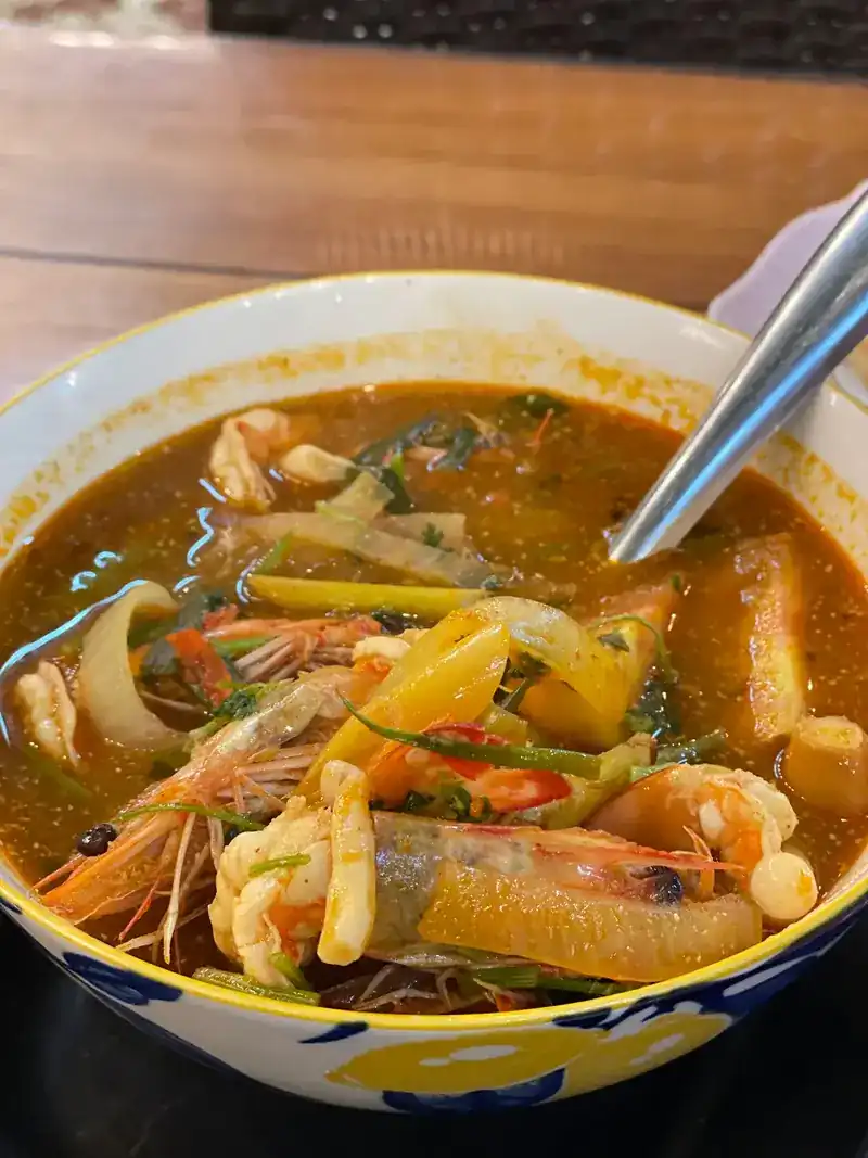 A bowl of spicy soup with prawns / ต้มรสจัดใส่กุ้งในชาม
