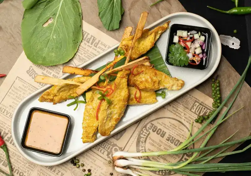 Chicken satay skewers with peanut sauce