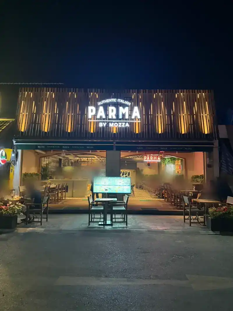 The restaurant on Lagoon Road at night, its front open to the street