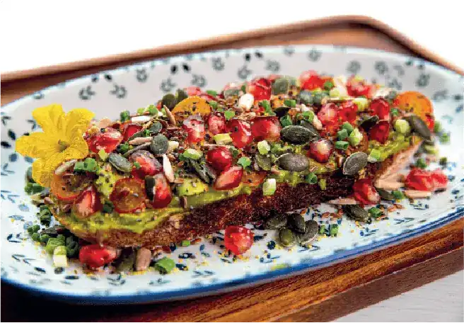 Melbourne: sourdough with avocado, pomegranate and seeds