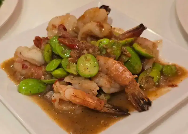 Prawns stir-fried with sator beans in a glossy sauce