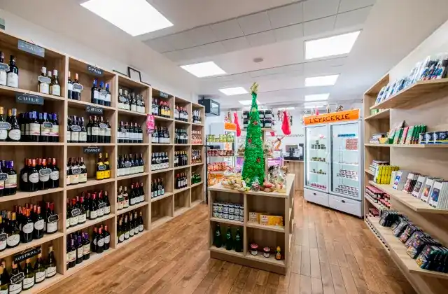 Shelves of the épicerie and wine cellar