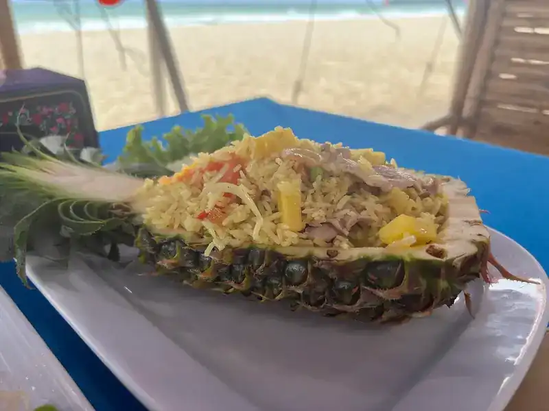 Fried rice served in half a pineapple