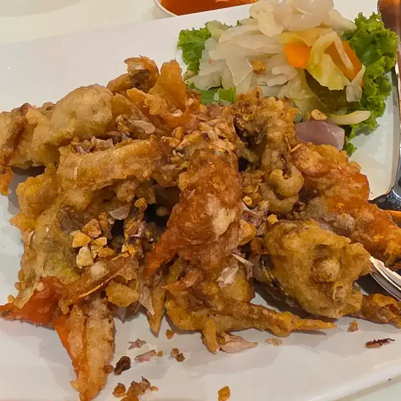 Crisp-fried seafood with pickled vegetables on the side