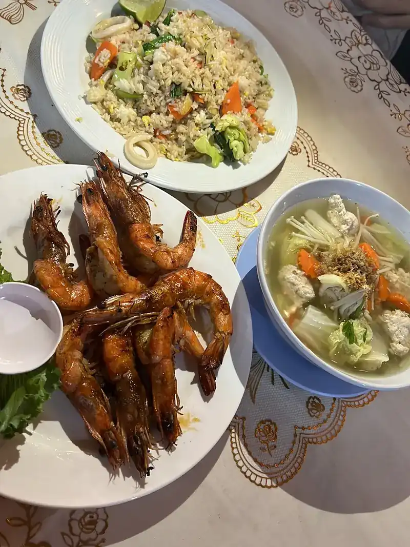 Fried rice, grilled prawns and a bowl of clear soup