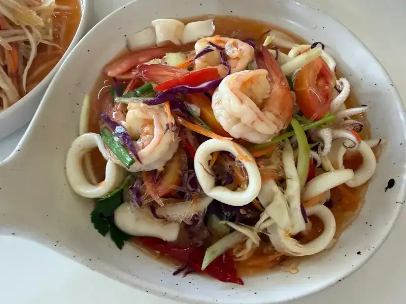 Spicy glass-noodle salad with prawns and squid rings