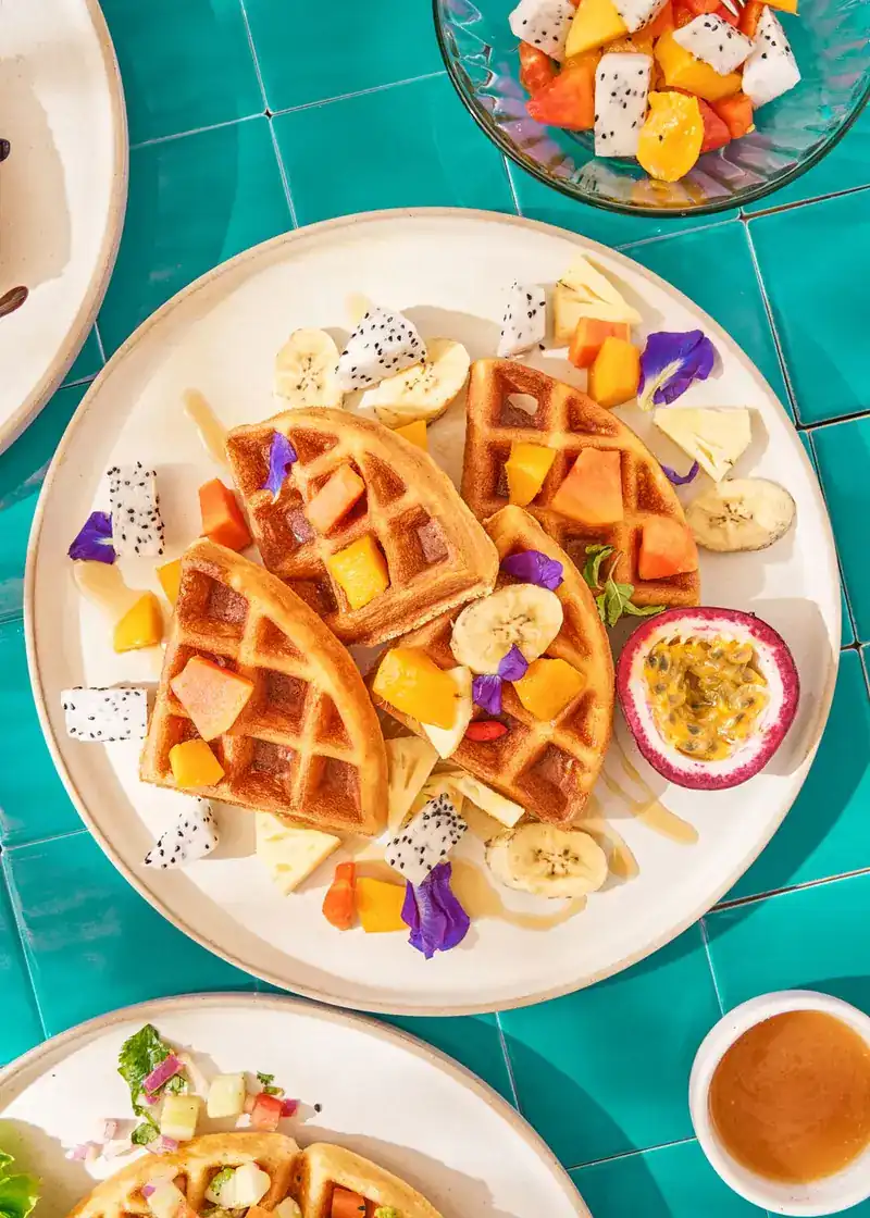 Waffles with banana, dragonfruit, papaya and passionfruit