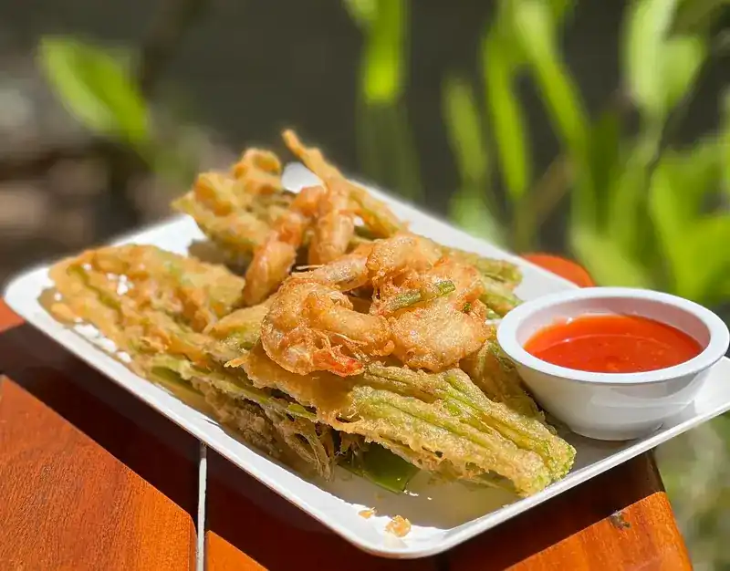 Greens and shrimp in batter, fried crisp, with sweet chilli sauce