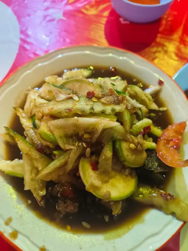 Tam taeng: cucumber pounded like som tam, with chilli and tomato