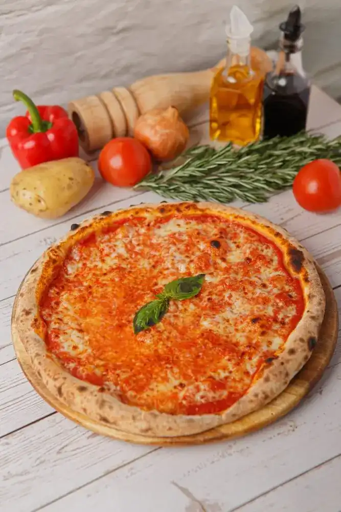 Pizza Margherita on a wooden board