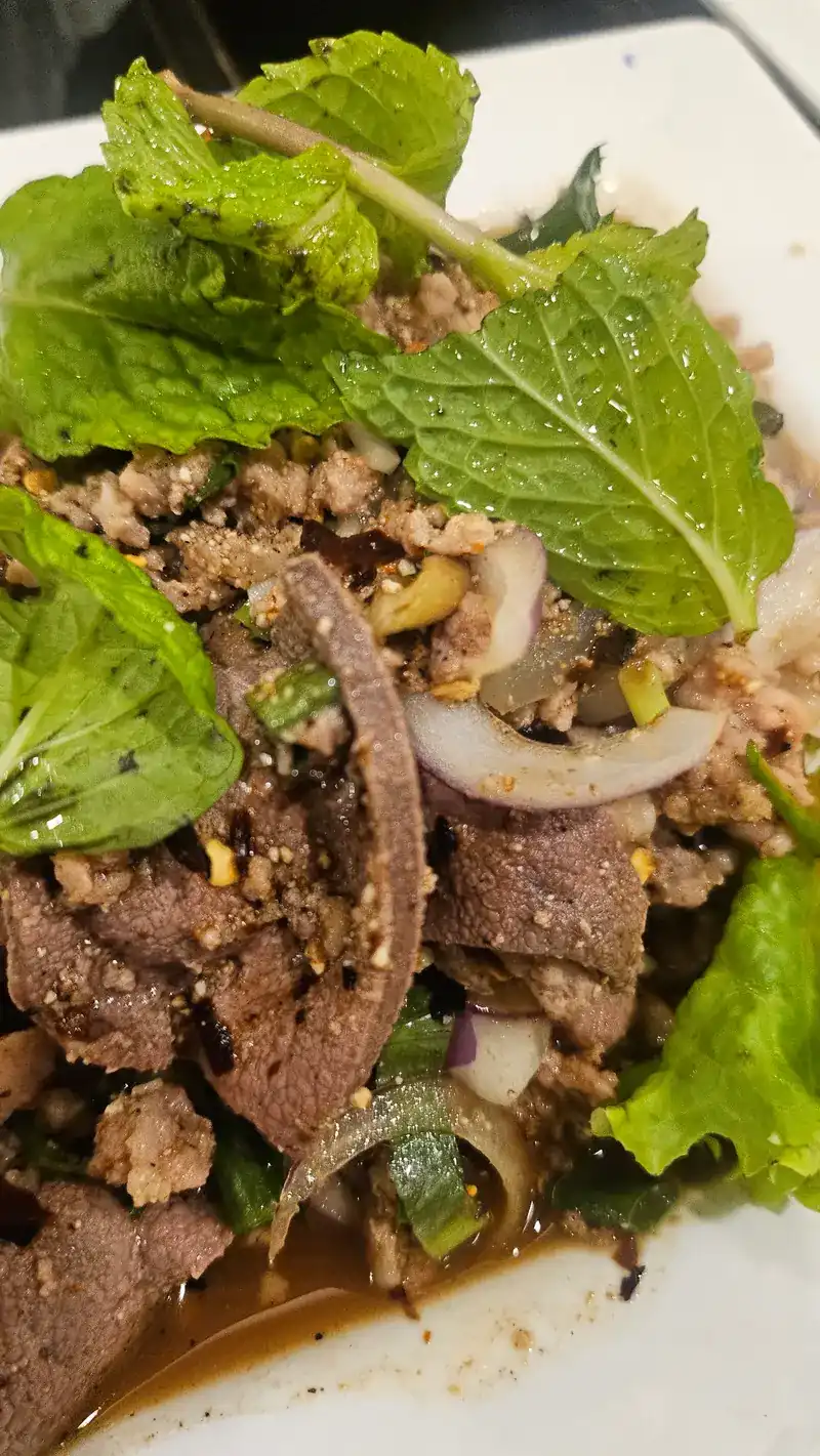 Sliced and minced meat tossed with fresh mint, onion and herbs