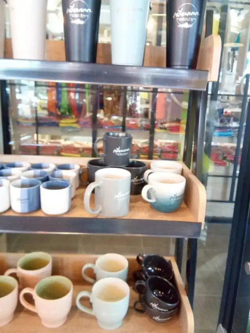 Shelves of mugs and Cheinna tumblers